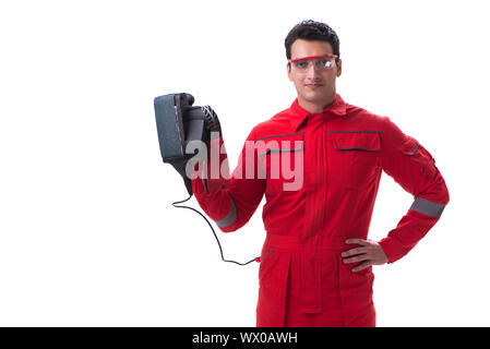 Junge Arbeitnehmer mit Bandschleifer schleifen Power Tool auf der whi isoliert Stockfoto