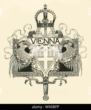 'Wien', Ende des 19. Anfang des 20. Jahrhunderts. Dekorative Wappen für die Stadt Wien, die Hauptstadt Österreichs, (früher Teil von Österreich-ungarn). Der doppelköpfige Adler, mit Girlanden aus Blumen und Obst, ist von einer Krone überragt, mit einem Schild, die mit einem Kreuz in der Mitte. Stockfoto