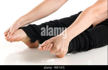 Beine in schwarzen Kniestrümpfe Aufwärmen Stockfoto