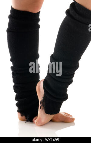 Beine in schwarzen Kniestrümpfe Aufwärmen Stockfoto