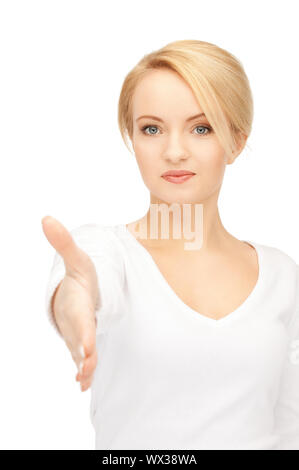Schöne Frau mit einer offenen Hand bereit für Handshake Stockfoto