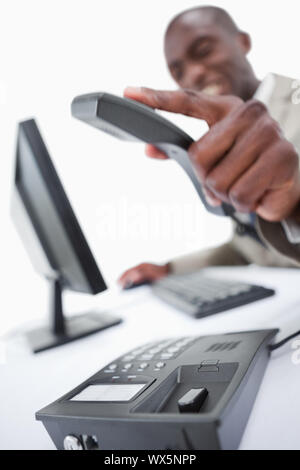 Porträt von einer wütenden Verkäufer aufhängen Stockfoto