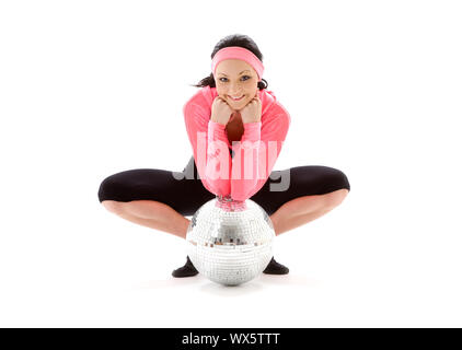 Bild von Tänzerin Mädchen mit Glitterball über weiß Stockfoto