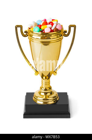 Goldene Trophäe Tasse mit Pillen Stockfoto