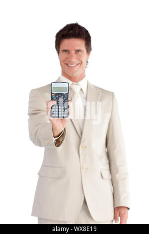 Fröhliche Geschäftsmann hält einen Taschenrechner Stockfoto
