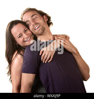 In der Nähe der nette junge Paare einander umarmen Stockfoto