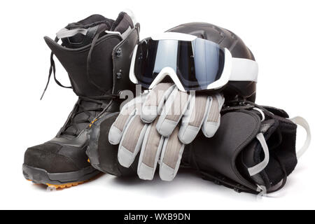 Snowboard Boots mit Helm, Handschuhe und Brille auf weißem Hintergrund Stockfoto