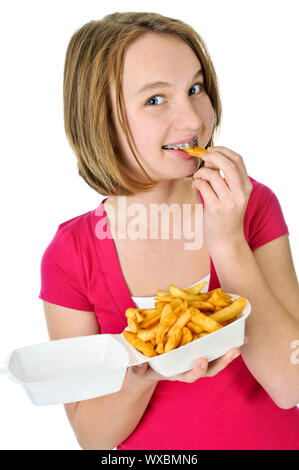 Teenage essen Pommes frites isoliert auf weißem Hintergrund Stockfoto