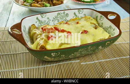 Cremige Pepperjack Chicken Enchiladas Stockfoto