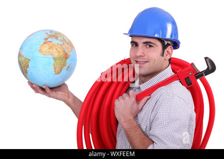 Kaufmann hält einen Globus Stockfoto