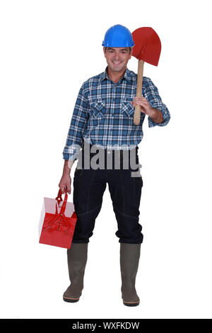 Handwerker mit einem Spaten und einer toolbox Stockfoto