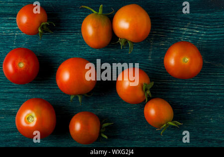 Tomaten auf dem Hintergrund. Tomaten Stockfoto