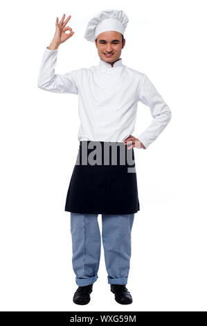 Glücklich männlichen Chef zeigt fantastische Geste Stockfoto