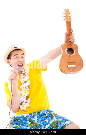 glücklicher Mann spielt Ukulele und Gesang Stockfoto