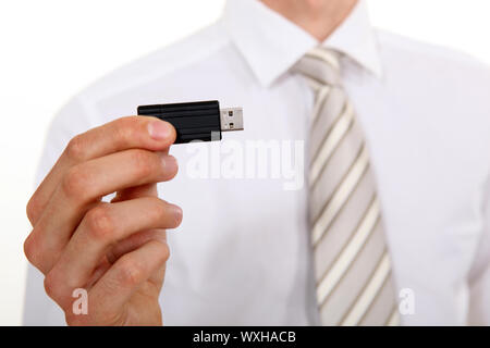 Geschäftsmann mit USB-stick Stockfoto