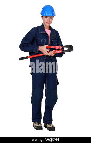 Frau mit boltcutters Stockfoto