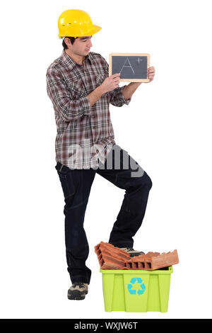 Baumeister Bewertung seiner recycling-Bemühungen Stockfoto