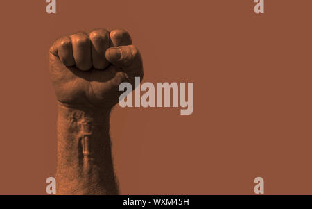 Angehobene geballte Faust mit viel Platz kopieren Text oder andere Bilder. Foto mit dem Sozialismus, Kommunismus, Revolution, Arbeiter und die Versorgung der Mitarbeiter Stockfoto