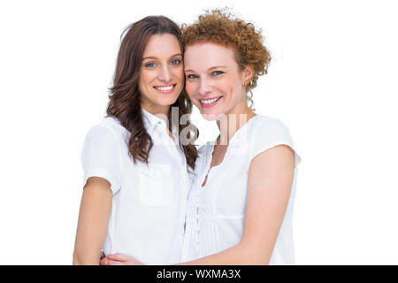 Zwei schöne Modelle posieren auf weißem Hintergrund Stockfoto