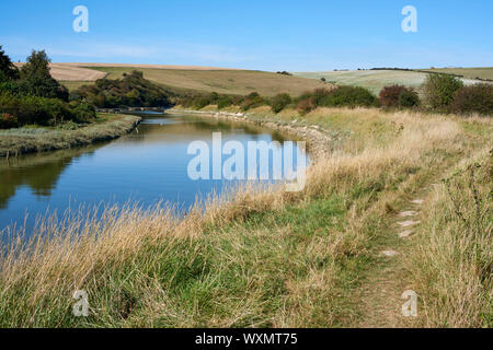 Die Gezeiten Fluss Cuckmere in der Nähe von Exceat, East Sussex, UK, im September Stockfoto