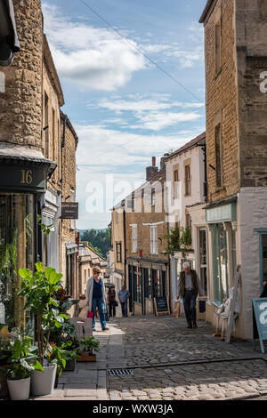 Geschäfte und Gebäude auf Catherine Hill in Frome Stadtzentrum in Somerset, Großbritannien Stockfoto