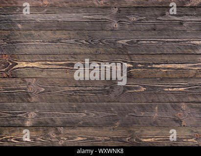 Dunkle alte Holz Textur mit Knoten Stockfoto