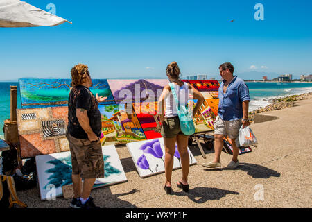 Artwork Anbieter auf dem Malecon, Puerto Vallarta, Jalisco, Mexiko. Stockfoto