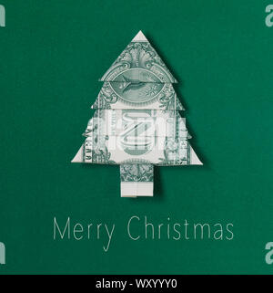Dollarschein gefaltet in der Form eines Weihnachtsbaumes Stockfoto