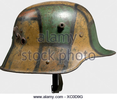 Ein stahlhelm Modell 1916 mit Mimikry, Tarnung und schweren Geschossen