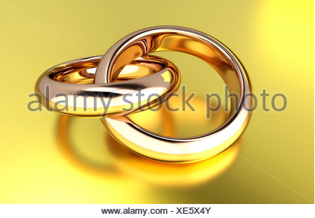 Golden Verschlungenen Ringe Fur Die Hochzeit Stockfotografie Alamy
