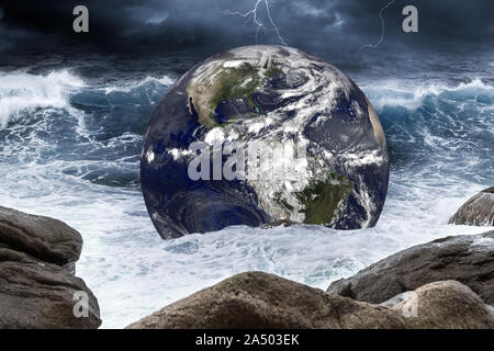Planeta Tierra mundo en tormenta ola de agua en el océano áspero. Cambio climático el calentamiento global concepto sobre el mar de fondo. Los elementos de esta imagen f