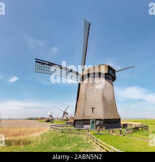 Banda de tres molinos de viento de Schermerhorn, Noord-Holland Foto de stock