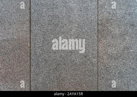 Granito gris antiguo con diseños finos. Textura y fondo de alta calidad
