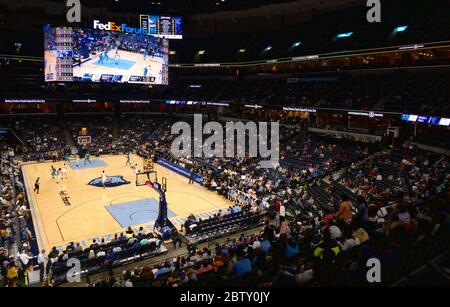 December 12, 2017; Memphis, TN, USA; The Memphis Tigers mascot, POUNCER,  and a Tigers cheerleader performing during an NCAA D1 basketball game. The  Memphis Tigers defeated the Albany Great Danes, 67-58, at