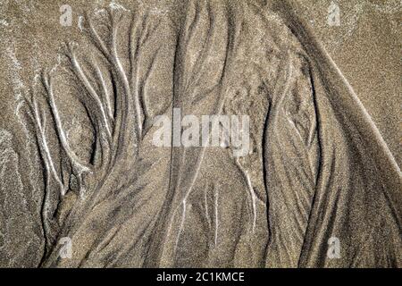 Textura de arena dibujado por ondas Foto de stock