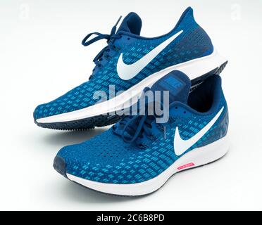 Jirafa Botánica Rezumar Dos zapatillas de running Nike Pegasus 35 azules y blancas Fotografía de  stock - Alamy