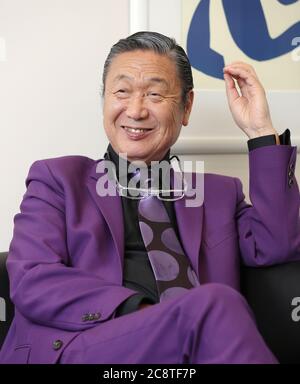 A file photo shows Japanese fashion designer Kansai Yamamoto speaks during  an interview in Tokyo on April 23, 2013. 76-year old Yamamoto made his  debut in 1971 as the first Japanese and