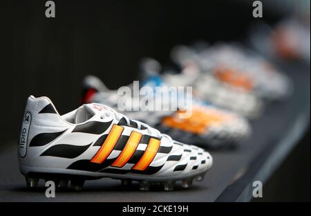 Aproximación revisión Orientar Adidas soccer shoes are pictured before the company's news conference in  the northern Bavarian town of Herzogenaurach, near Nuremberg June 24, 2014.  German sportswear firm Adidas expects to meet its target for