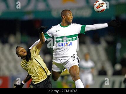 Bomfim (R) of Brazil's Coritiba battles Luis Enrique Quinones of ...