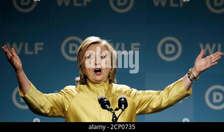 Former U.S. Secretary of State Hillary Clinton addresses the Democratic National Committee's Women's Leadership Forum annual Issues Conference in Washington, September 19, 2014.  REUTERS/Jim Bourg  (UNITED STATES - Tags: POLITICS)
