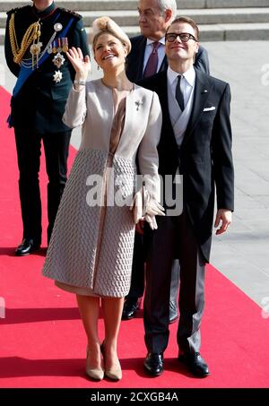 Sweden's Crown Princess Victoria (L) and Prince Daniel arrive at the religious wedding service of Luxembourg's Hereditary Grand Duke Guillaume and Countess Stephanie de Lannoy at the Notre-Dame Cathedral in Luxembourg October 20, 2012.              REUTERS/Francois Lenoir (LUXEMBOURG  - Tags: ENTERTAINMENT SOCIETY ROYALS)