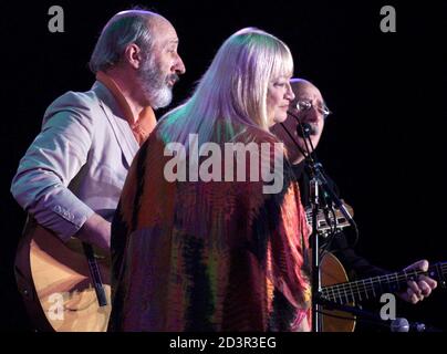 Legendary American folk music pioneeers Peter, Paul & Mary perform during their frist concert in Hong Kong late March 9, 2001. The group is composed of Noel Paul Stookey (L), Mary Travers (C) and Peter Yarrow.