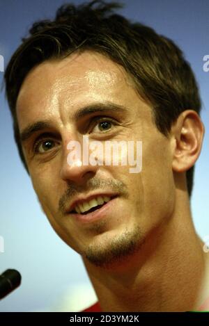 Manchester United and England defender Gary Neville addresses a news conference at the Head Office of the airline AirMalta in Luqa, outside Valletta, June 30, 2003. [A regular visitor to Malta, Gary Neville signed a two year contract to serve as an ambassador promoting Malta as a tourist] ?? OUT