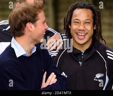 Britain's Prince William laughs with captain of the All Blacks Tana Umaga at a public training session in Auckland.  Britain's Prince William (L) laughs with the captain of the All Blacks Tana Umaga at a public training session in Auckland July 4, 2005. Prince William, who graduated recently from Scotland's St Andrews University, met the All Black team two days after they defeated the British and Irish Lions in Wellington and took an unbeatable 2-0 lead in the best-of-three test series. Prince William is also performing official duties during his ten-day tour of New Zealand, his first official
