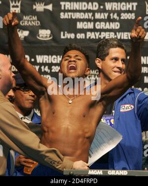 Middleweight boxer Felix 'Tito' Trinidad of Cupey Alto, Puerto Rico yells to fans during an official weigh-in at the MGM Grand Garden Arena in Las Vegas, Nevada May 13, 2005. Trinidad (42-1) takes on Winky Wright (48-3) of St. Petersburg, Florida in a 12-round WBC championship elimination bout at the arena May 14. Both fighters weighed the 160 pound limit. REUTERS/Steve Marcus  SM/SV