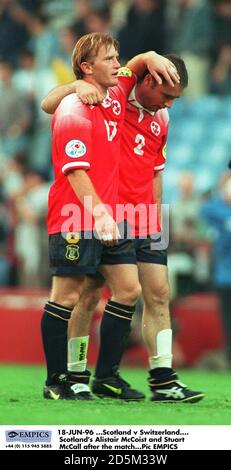 18-JUN-96 ...Escocia contra Suiza. Ally McCoist y Stuart McCall de Escocia después del partido
