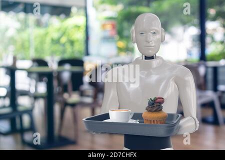 inteligente y práctico chef asistente robótico en concepto de tecnología de cocina, robot recibir un pedido y cocinar la receta por programa y puede Foto de stock