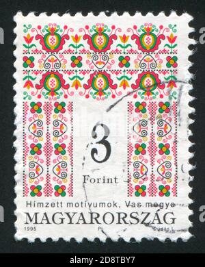 HUNGRÍA - ALREDEDOR de 1995: Sello impreso por Hungría, muestra ornamento, alrededor de 1995 Foto de stock