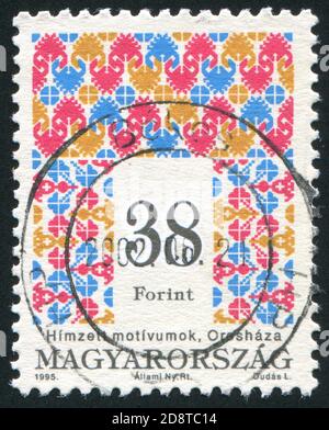 HUNGRÍA - ALREDEDOR de 1995: Sello impreso por Hungría, muestra ornamento, alrededor de 1995 Foto de stock