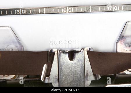 Palabra de éxito escrito en la máquina de escribir antigua Foto de stock